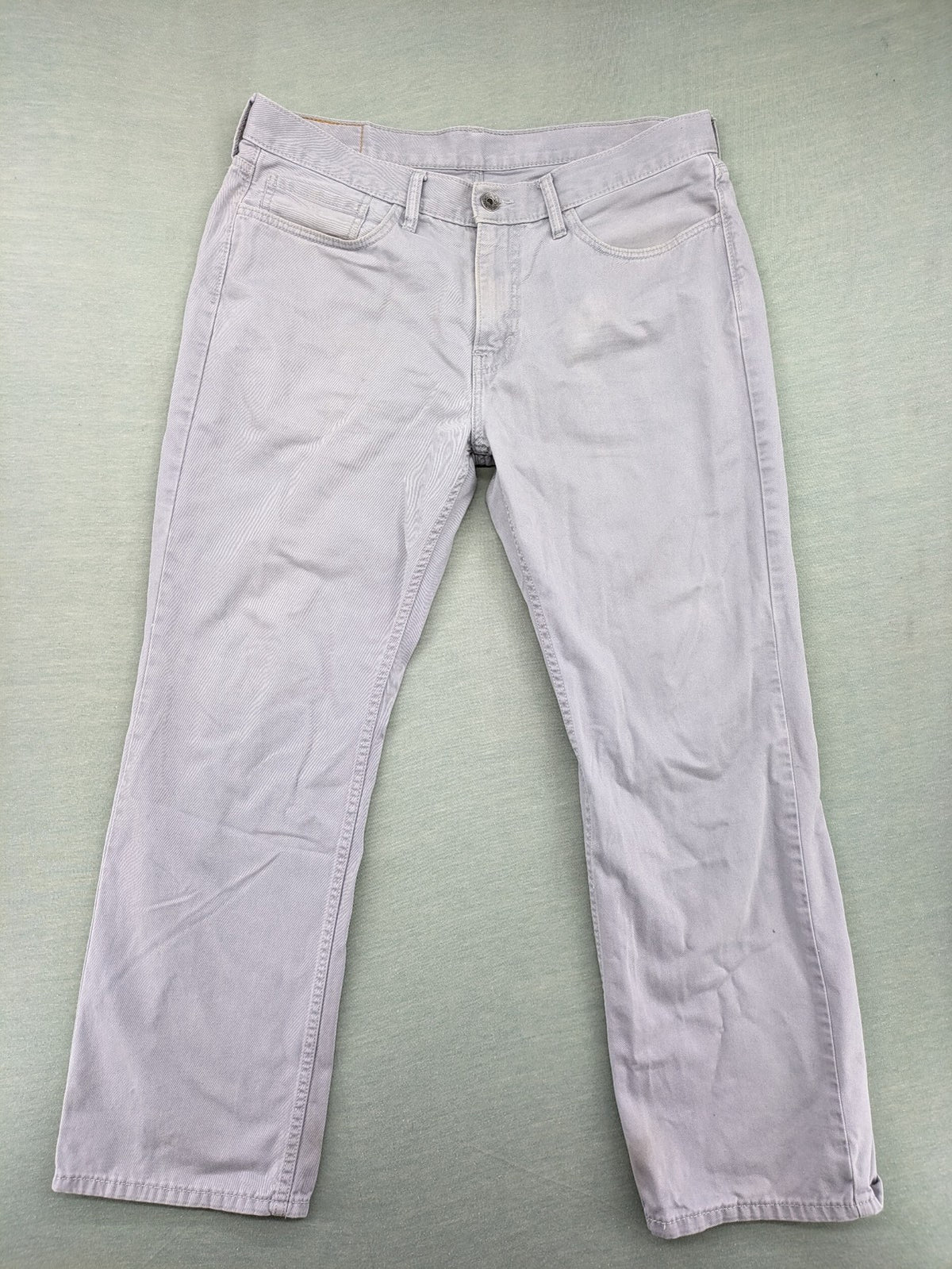 Levi's straight jeans purple classic 5-pocket design with iconic leather patch.