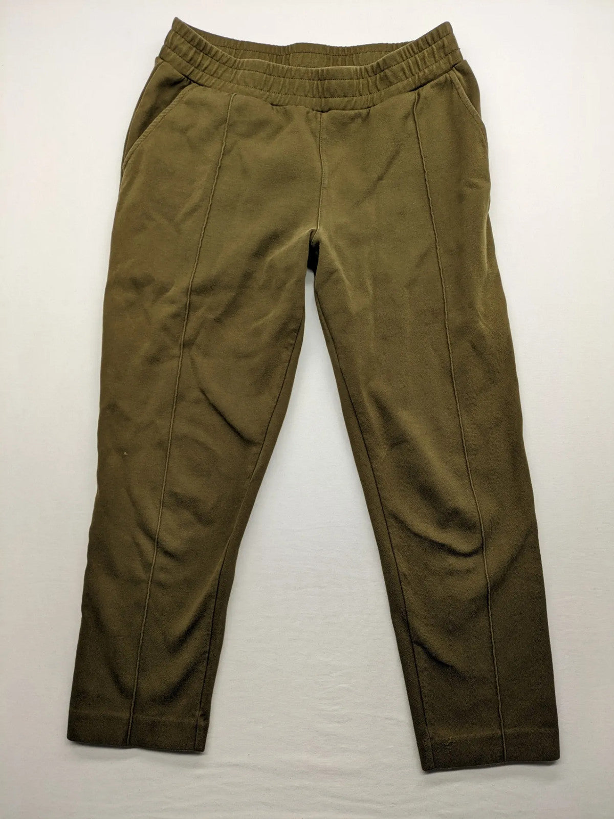 Marc O'Polo khaki joggers with elastic waistband and stylish front seams.