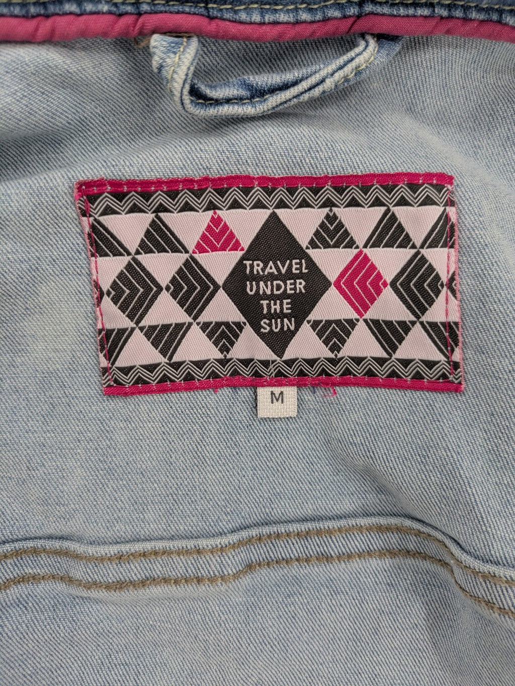 hle blue denim jacket lightwash classic trucker style with pink collar trim and pockets