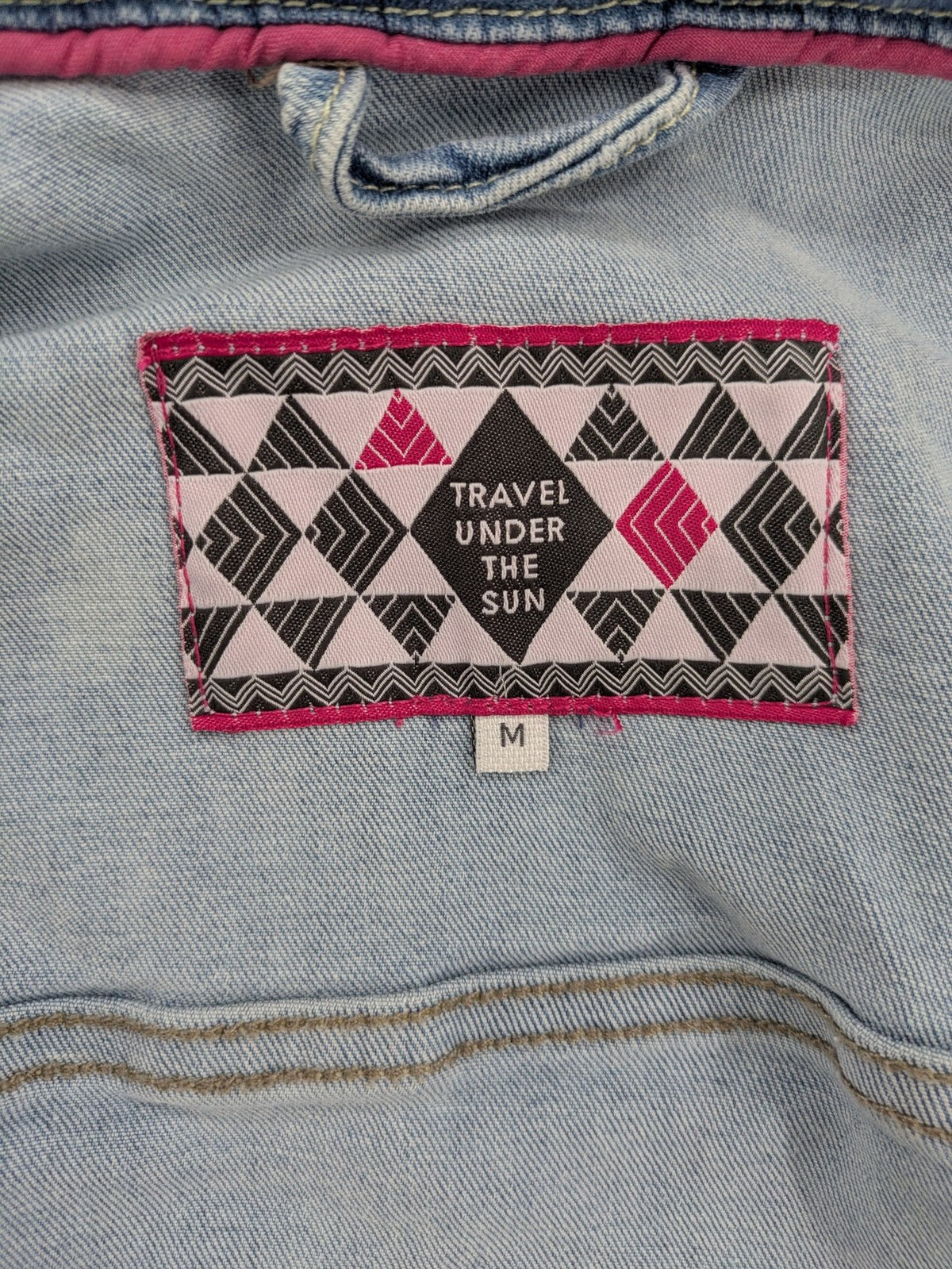 hle blue denim jacket lightwash classic trucker style with pink collar trim and pockets