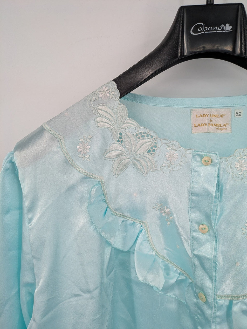 Linea blue vintage nightgown satin fabric with embroidered floral lace collar and ruffles.