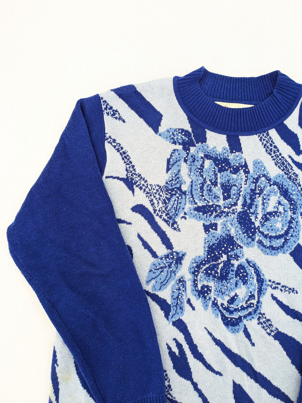 Rodeo pink knit jumper floral animal print with rhinestones and soft fabric.