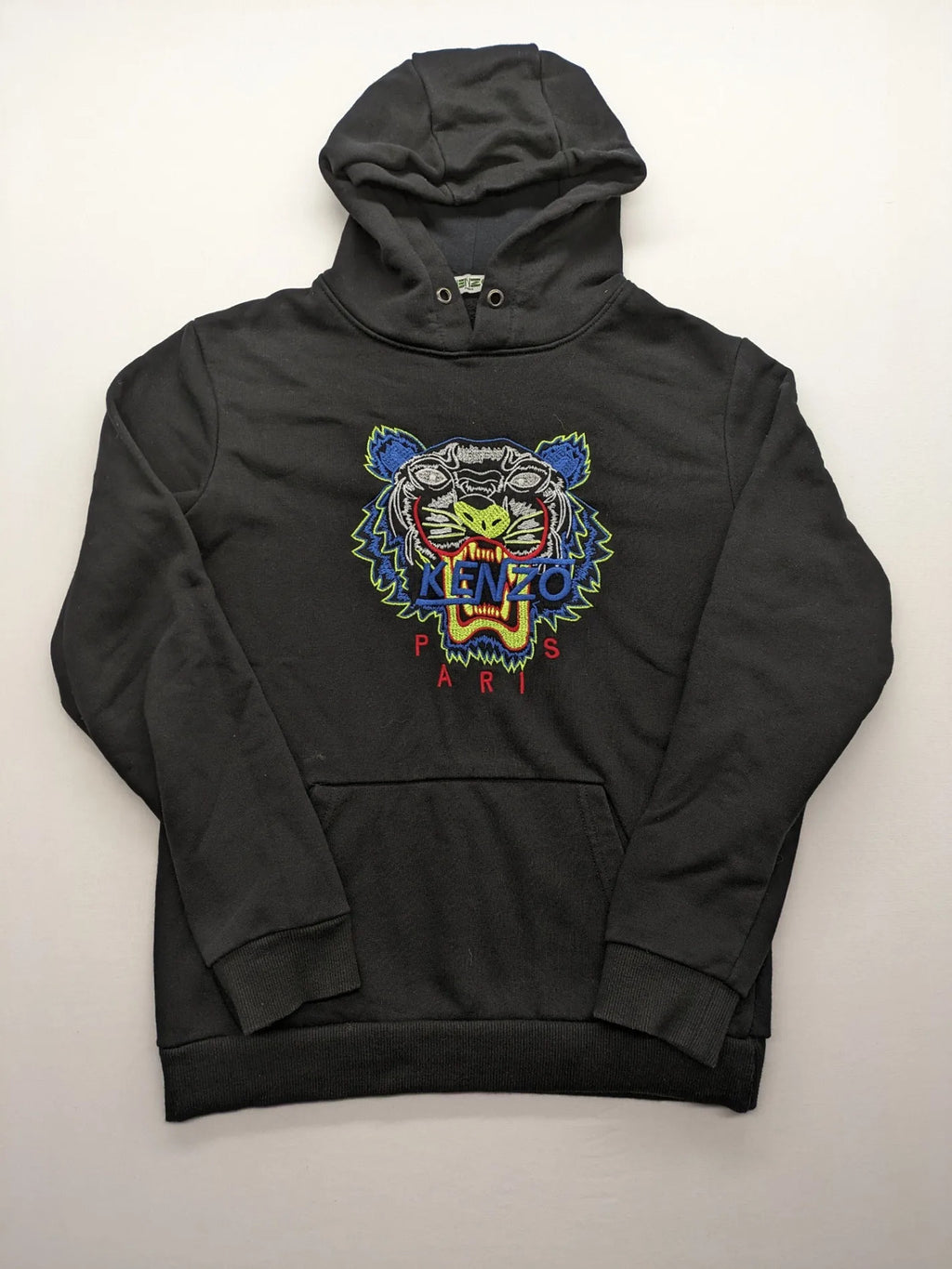 Kenzo multi hoodie with embroidered tiger graphic, drawstring hood, and kangaroo pocket.