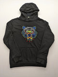 Kenzo multi hoodie with embroidered tiger graphic, drawstring hood, and kangaroo pocket.