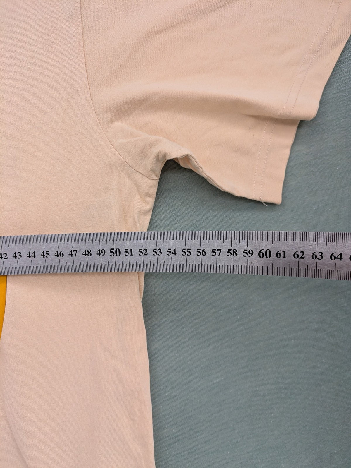 Dragon Ball Z beige t-shirt relaxed fit featuring Goku Go kanji symbol.
