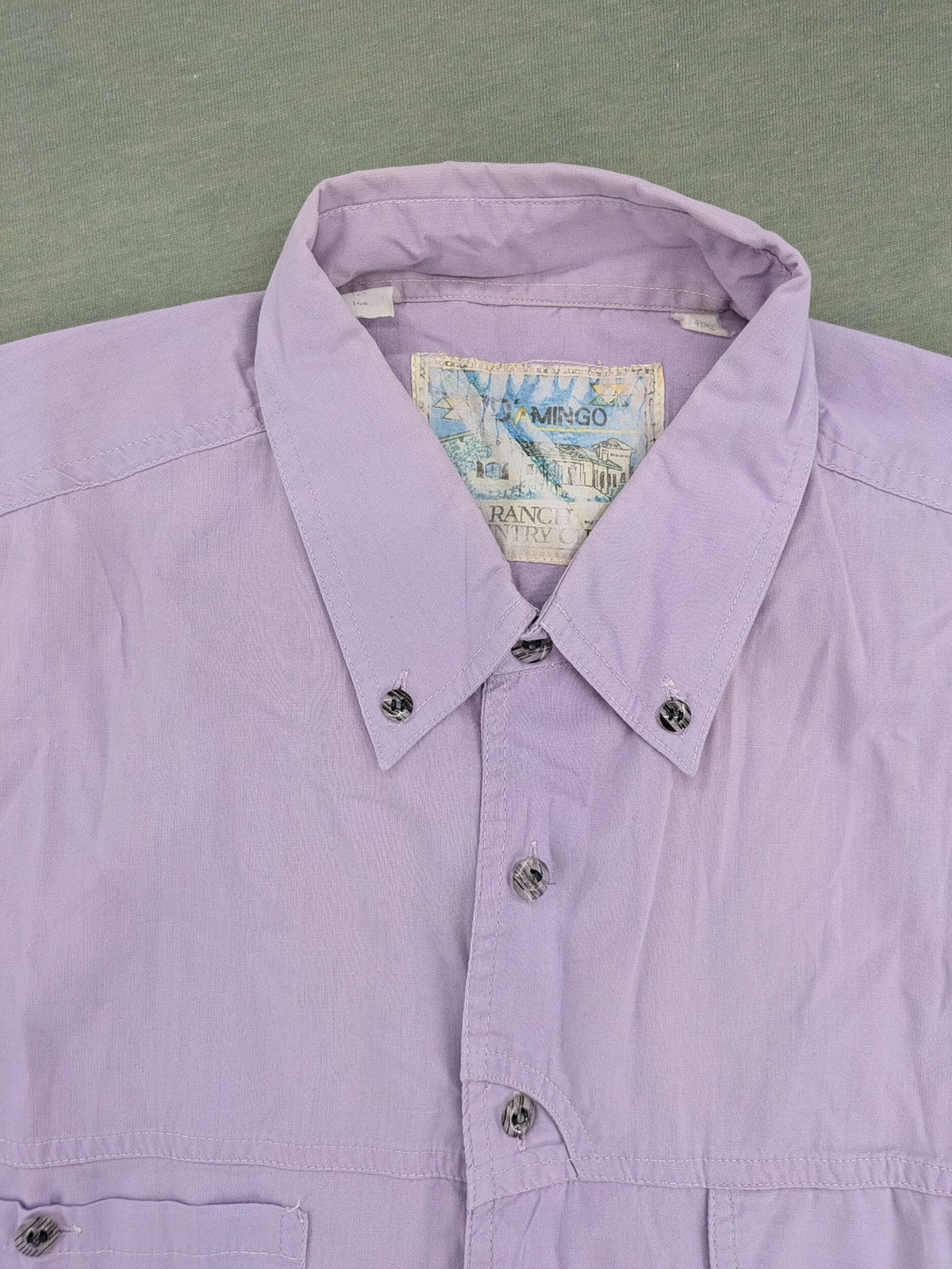 Mingo purple short-sleeve button-down shirt with classic collar and chest pockets.
