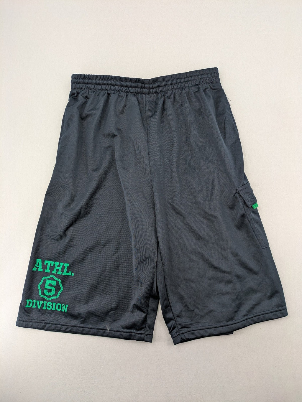 okay grey cargo shorts with green "ATHL. 5 DIVISION" graphic print and side pocket.