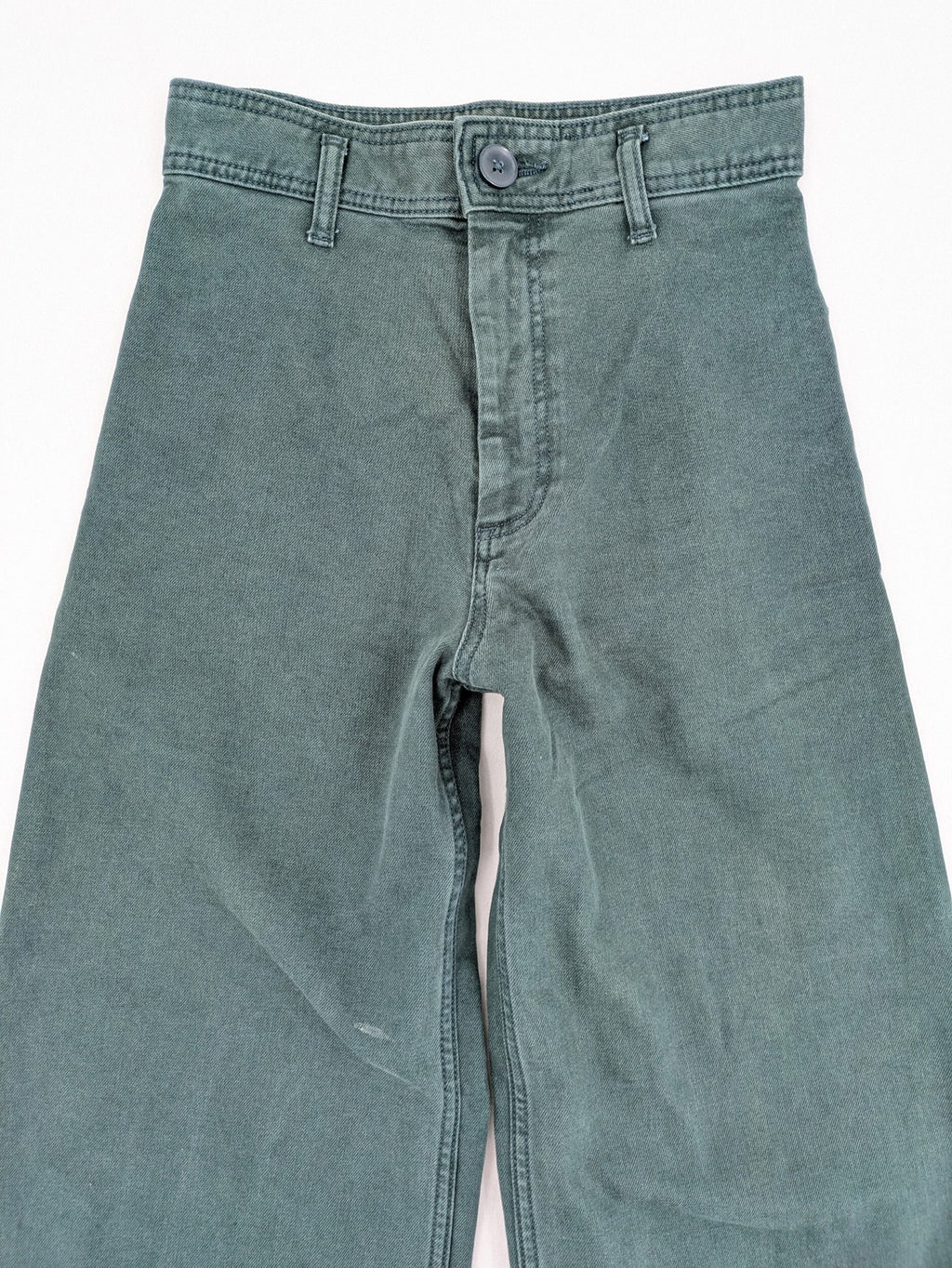 Zara green high waist wide leg jeans with frayed hem and button closure.