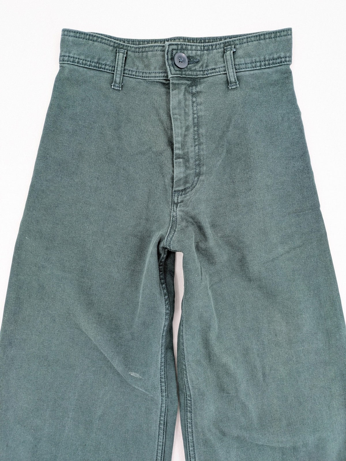 Zara green high waist wide leg jeans with frayed hem and button closure.