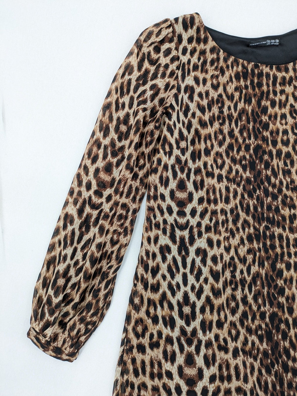 Atmosphere beige leopard print dress with sheer chiffon sleeves and buttoned cuffs.