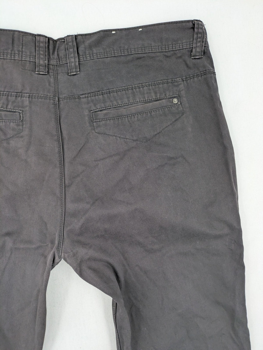 Denim & Co. grey chino pants cotton workwear with button fly and pocket rivets.