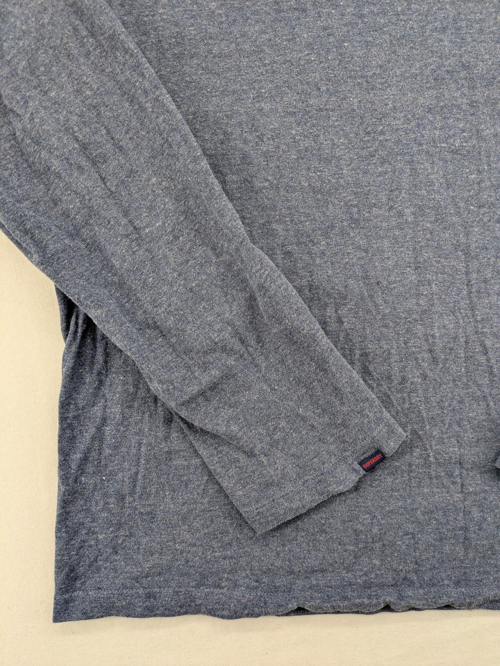 Superdry grey long sleeve shirt melange with embroidered logo and red collar accent.