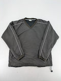 Tombo green windbreaker jacket with white piping, V-neck, and zippered pockets.