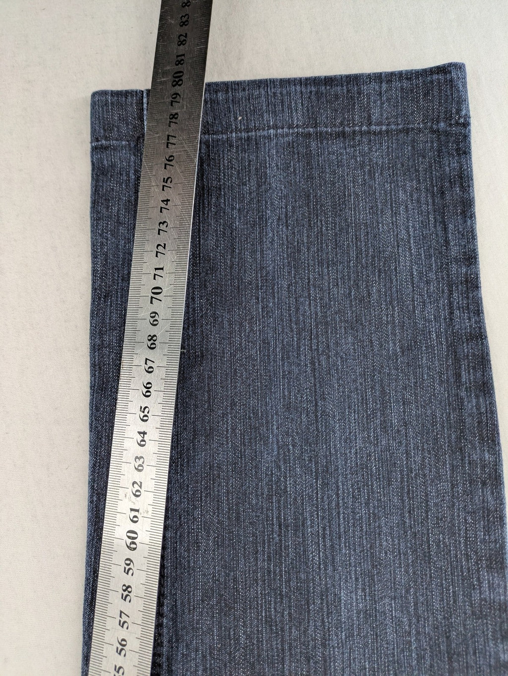 Review straight leg jeans dark blue low rise stretch denim with classic design.