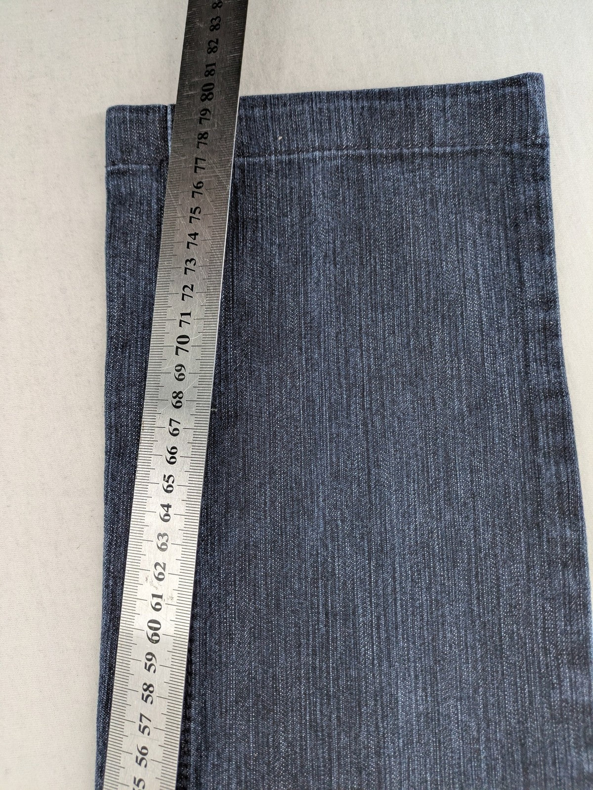 Review straight leg jeans dark blue low rise stretch denim with classic design.