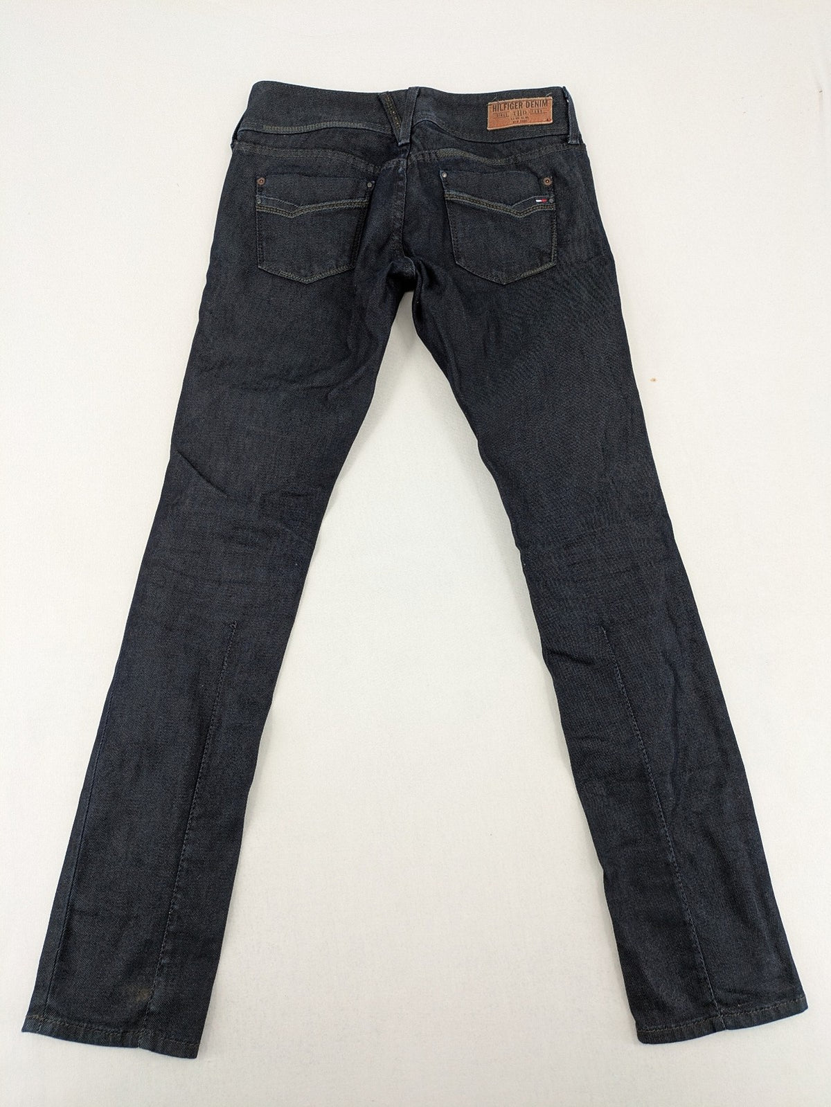 Hilfiger Denim blue straight jeans with double button closure and logo detail.