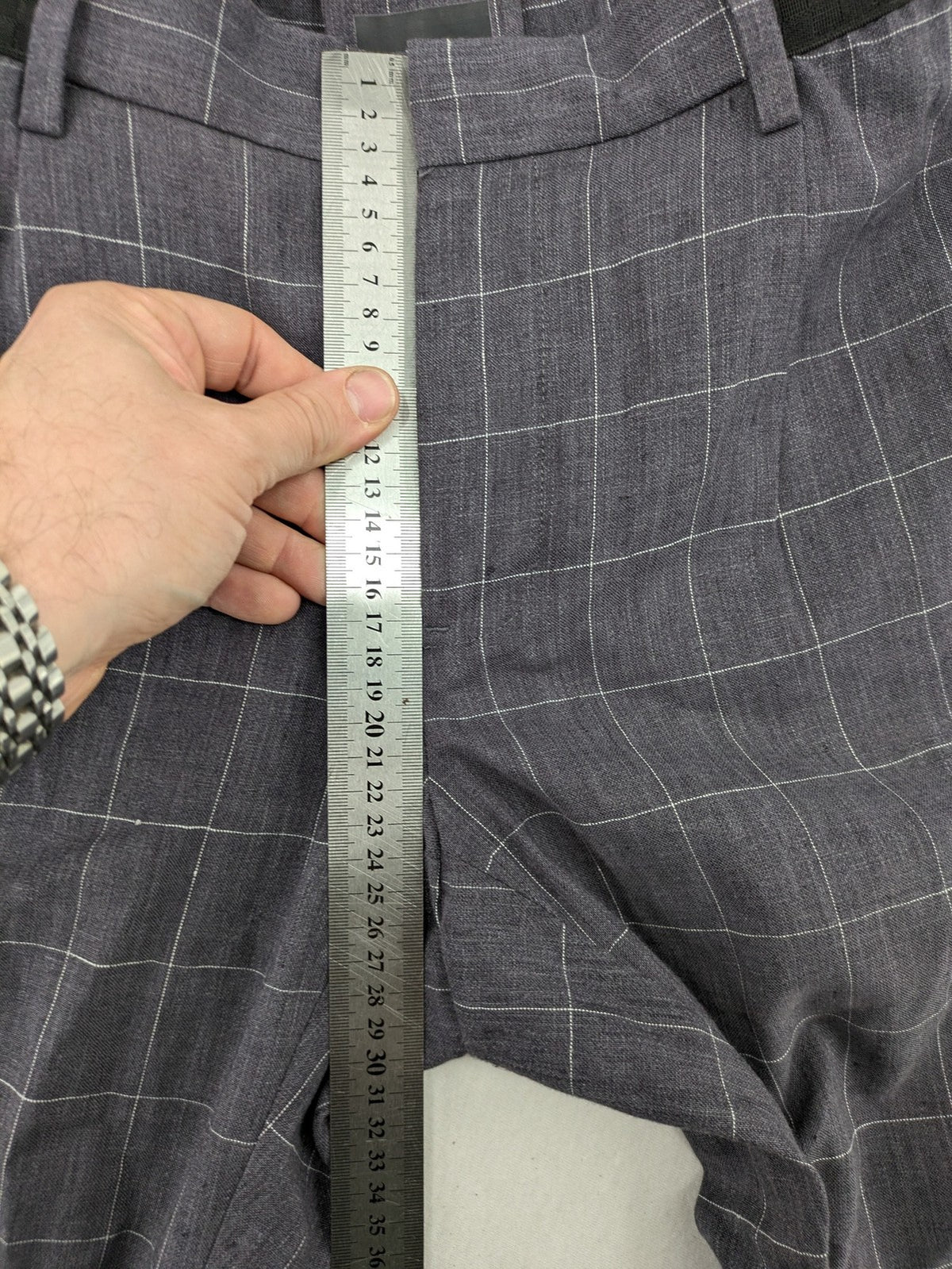 MNG Man grey plaid pants with rolled hem and stretch performance material.