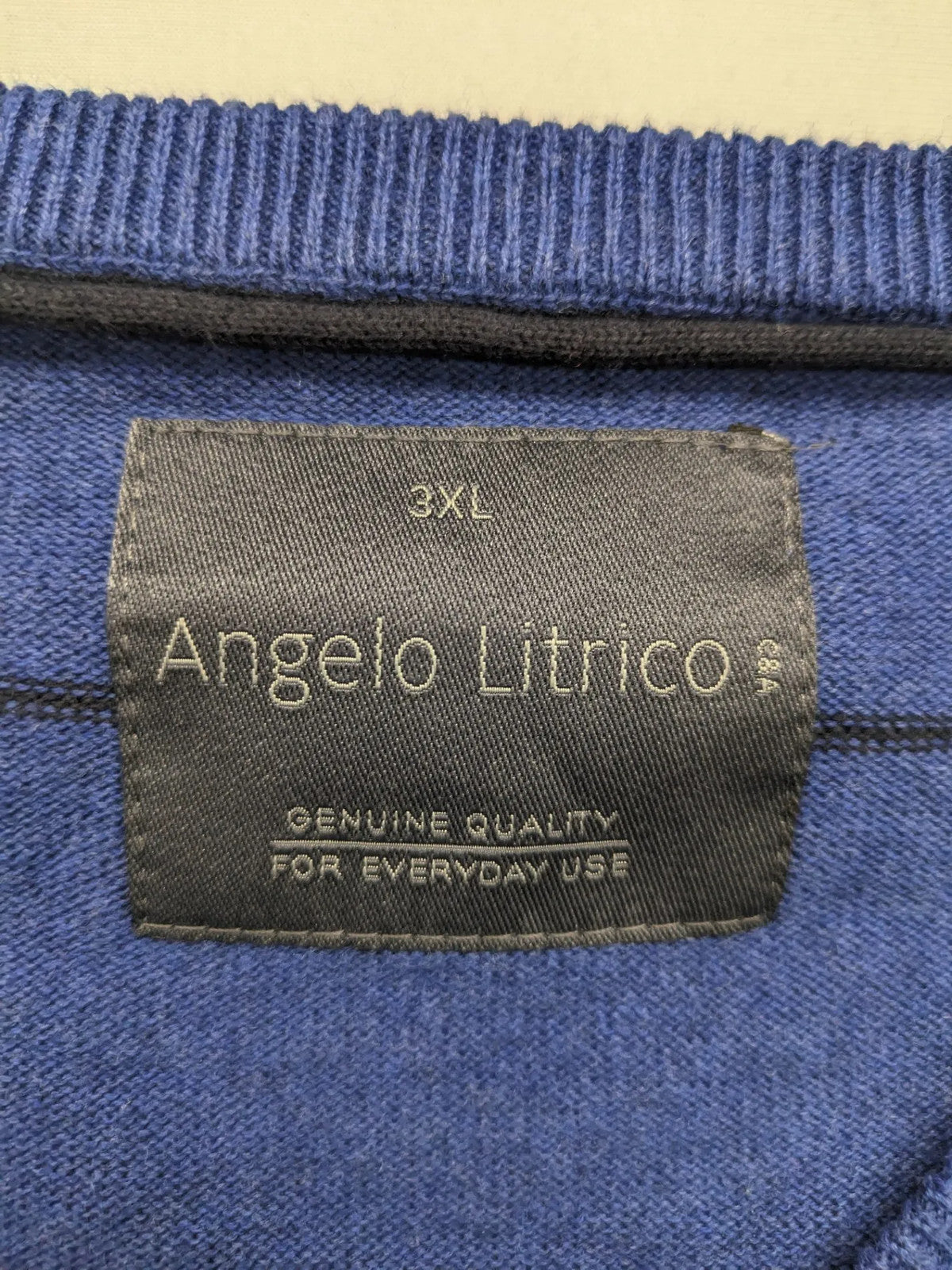 Angelo Litrico blue and navy striped turtle neck jumper with V-neck and cotton material.