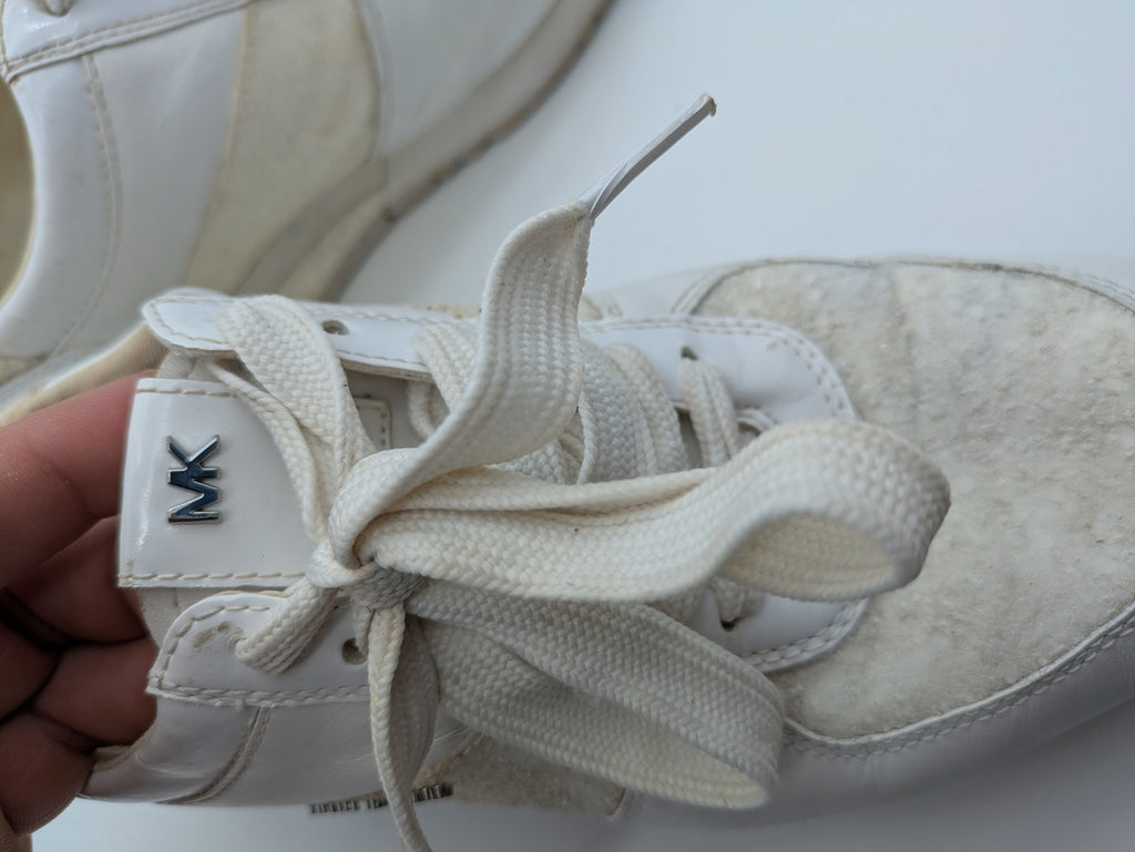 Michael Kors multi sneaker white leather and cream textile with silver logo details.