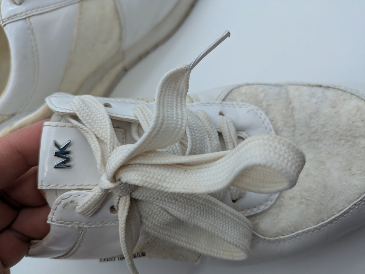 Michael Kors multi sneaker white leather and cream textile with silver logo details.