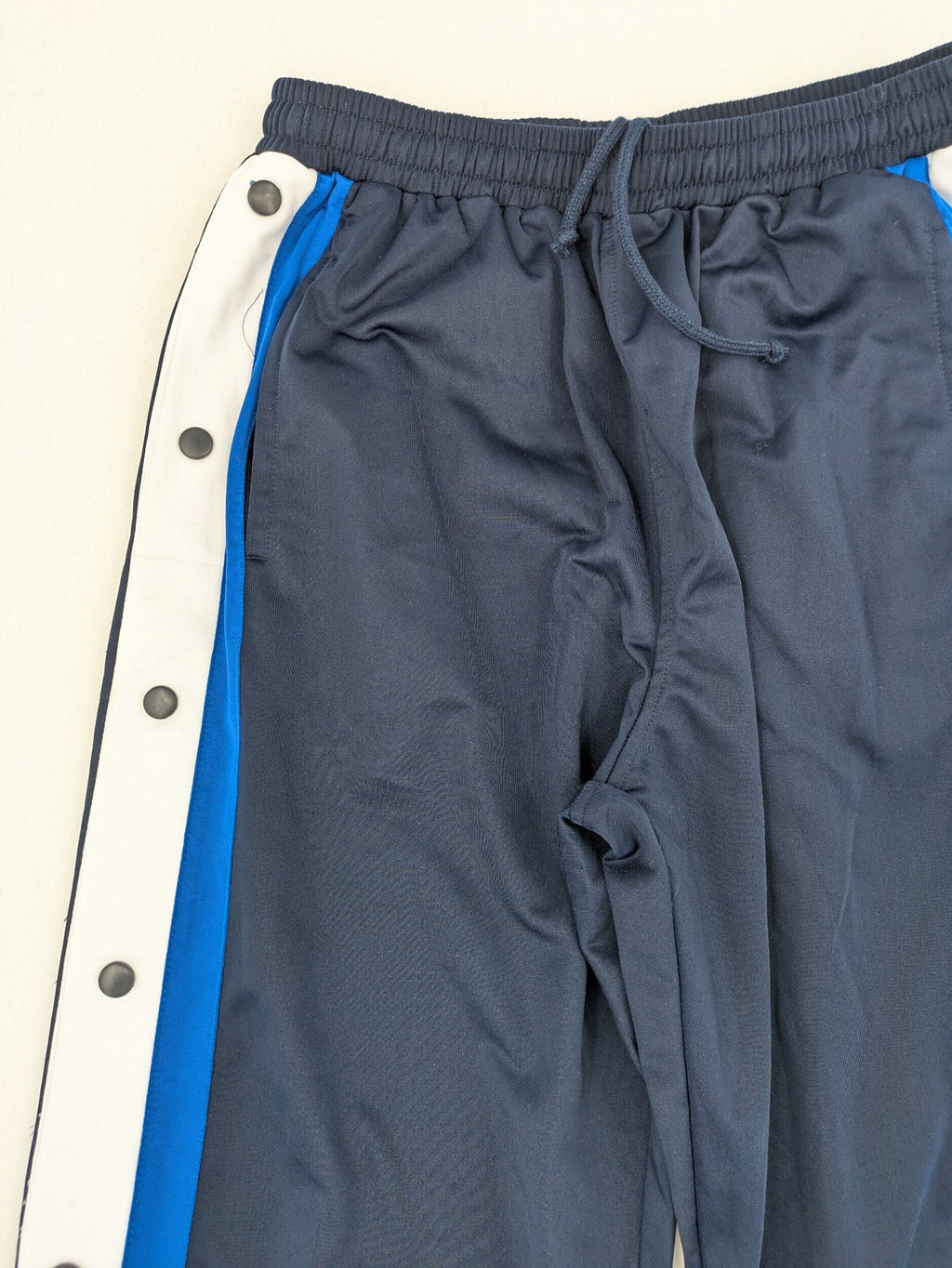 McORVIS blue tearaway training pants with side snap buttons and elastic waistband.