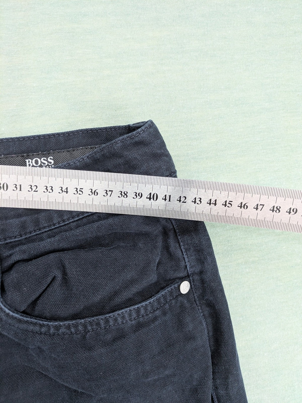 BOSS Hugo Boss grey straight jeans classic 5-pocket design with leather patch.