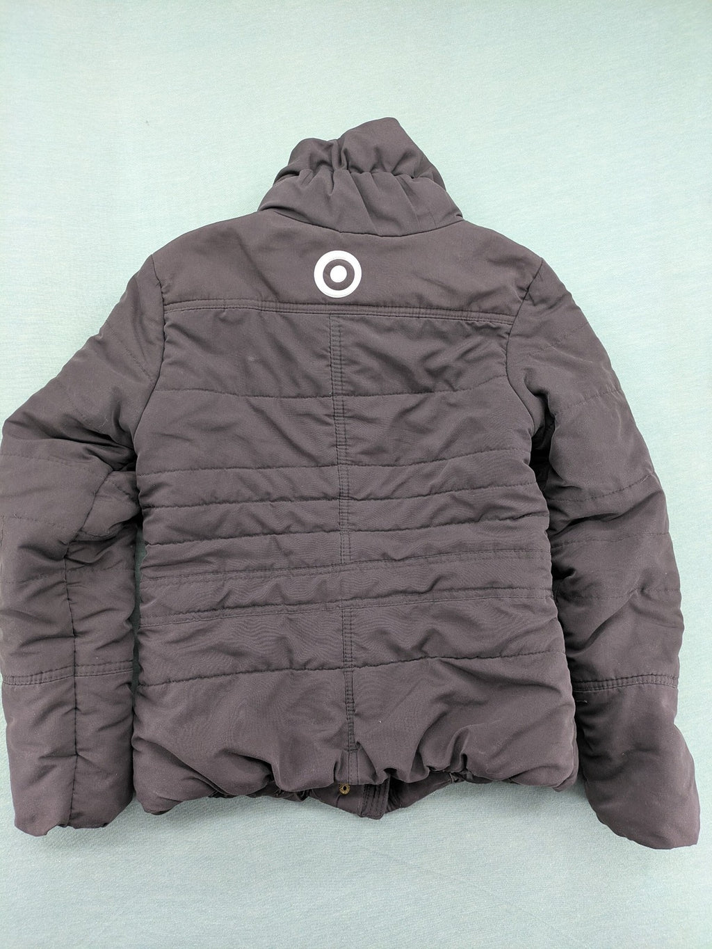 Vero Moda grey quilted jacket with high funnel neck and zippered pockets.