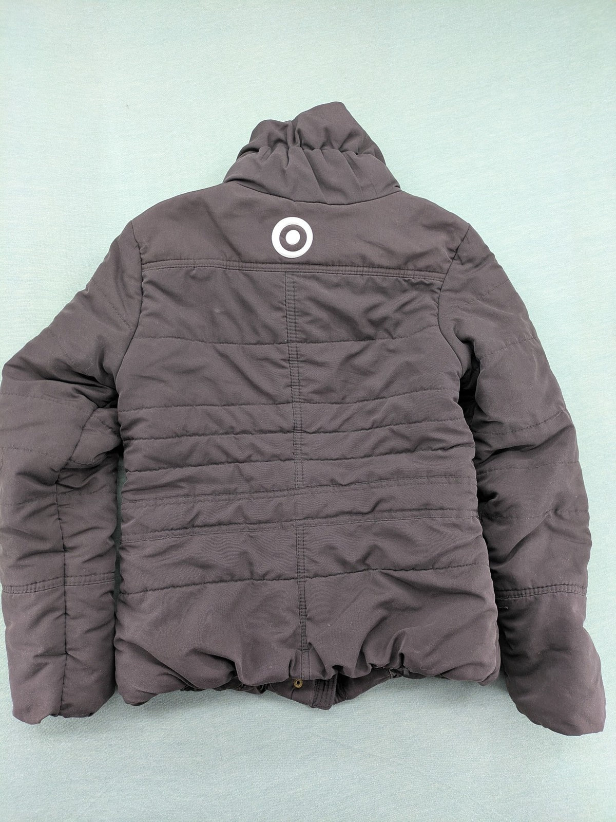 Vero Moda grey quilted jacket with high funnel neck and zippered pockets.