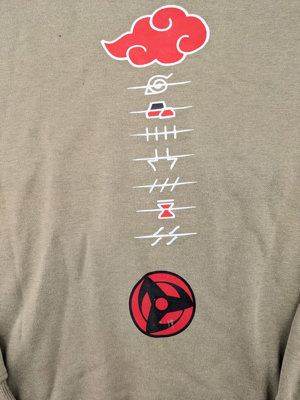 Naruto khaki turtle neck jumper featuring red Akatsuki cloud and Sharingan symbols.