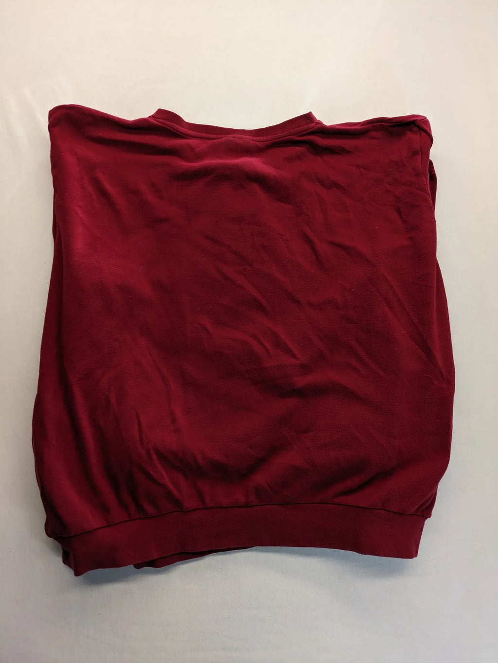 Normann red turtle neck jumper with large anchor print and side pockets.