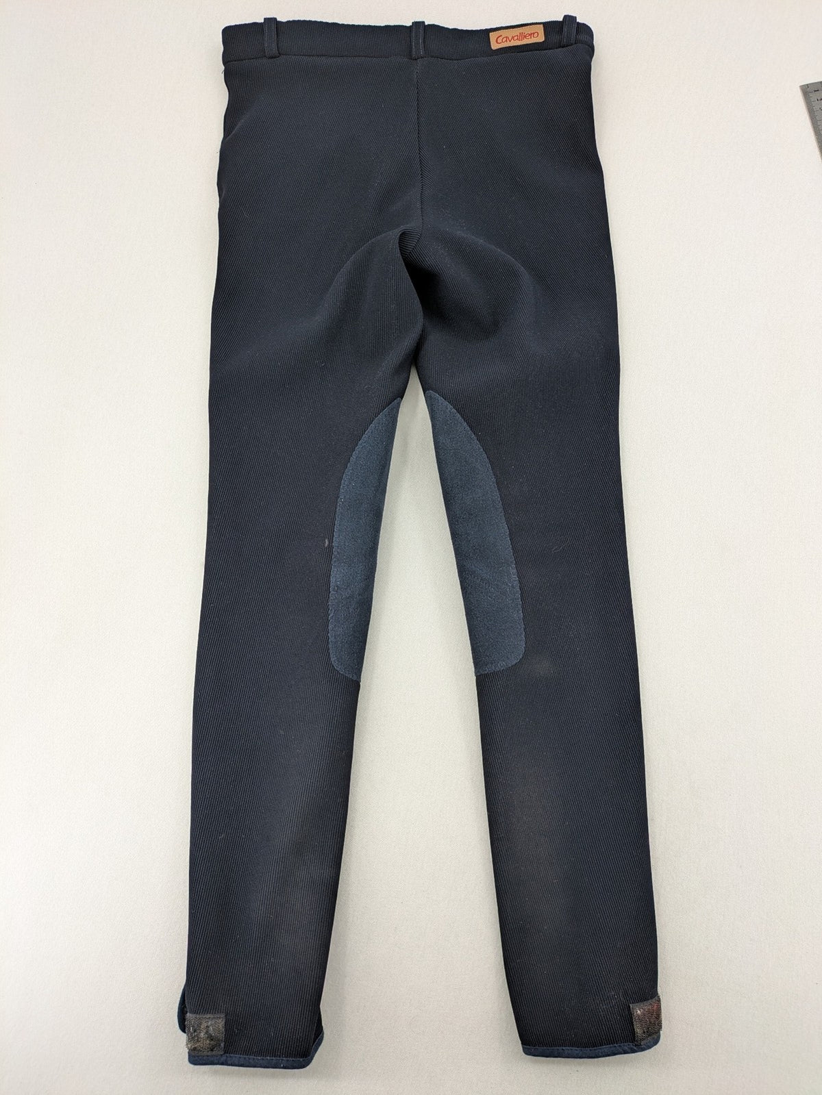 Cavalliero blue youth riding pants with knee patches and ribbed microfiber fabric.