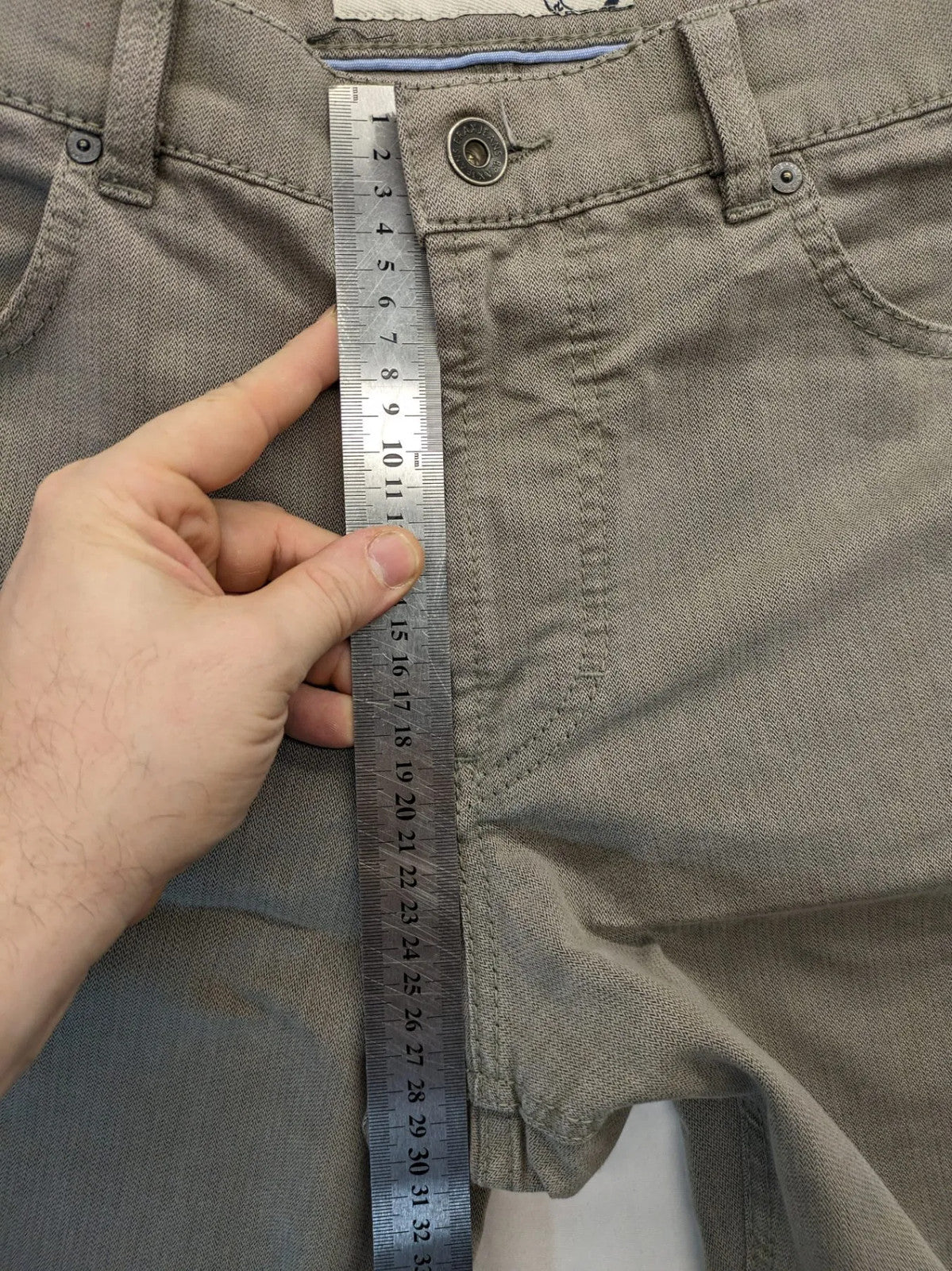 BRAX grey straight jeans 5-pocket design with zipper fly and soft fabric.