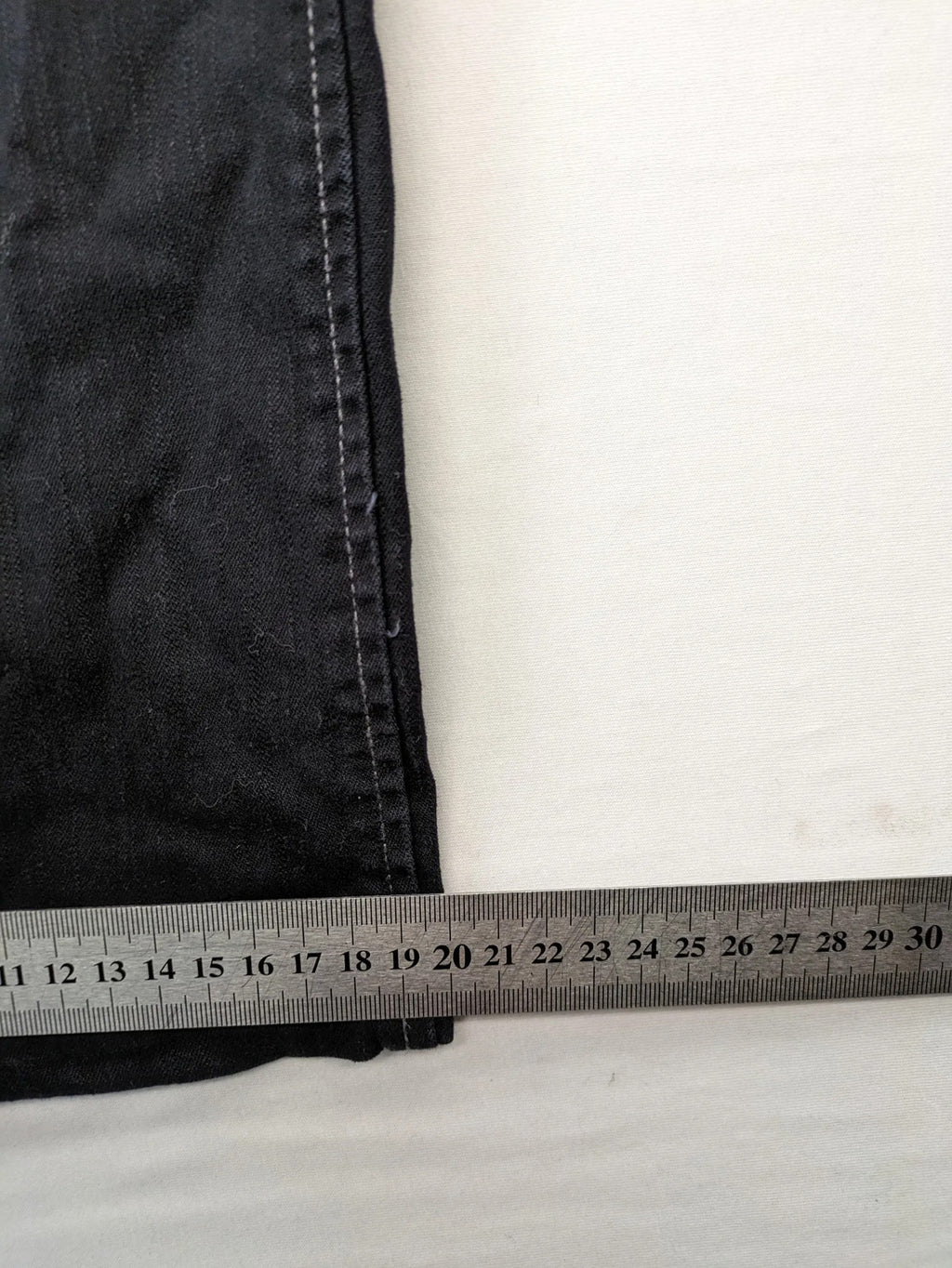 Okay grey straight jeans with contrast stitching and three-button closure, cotton stretch material.