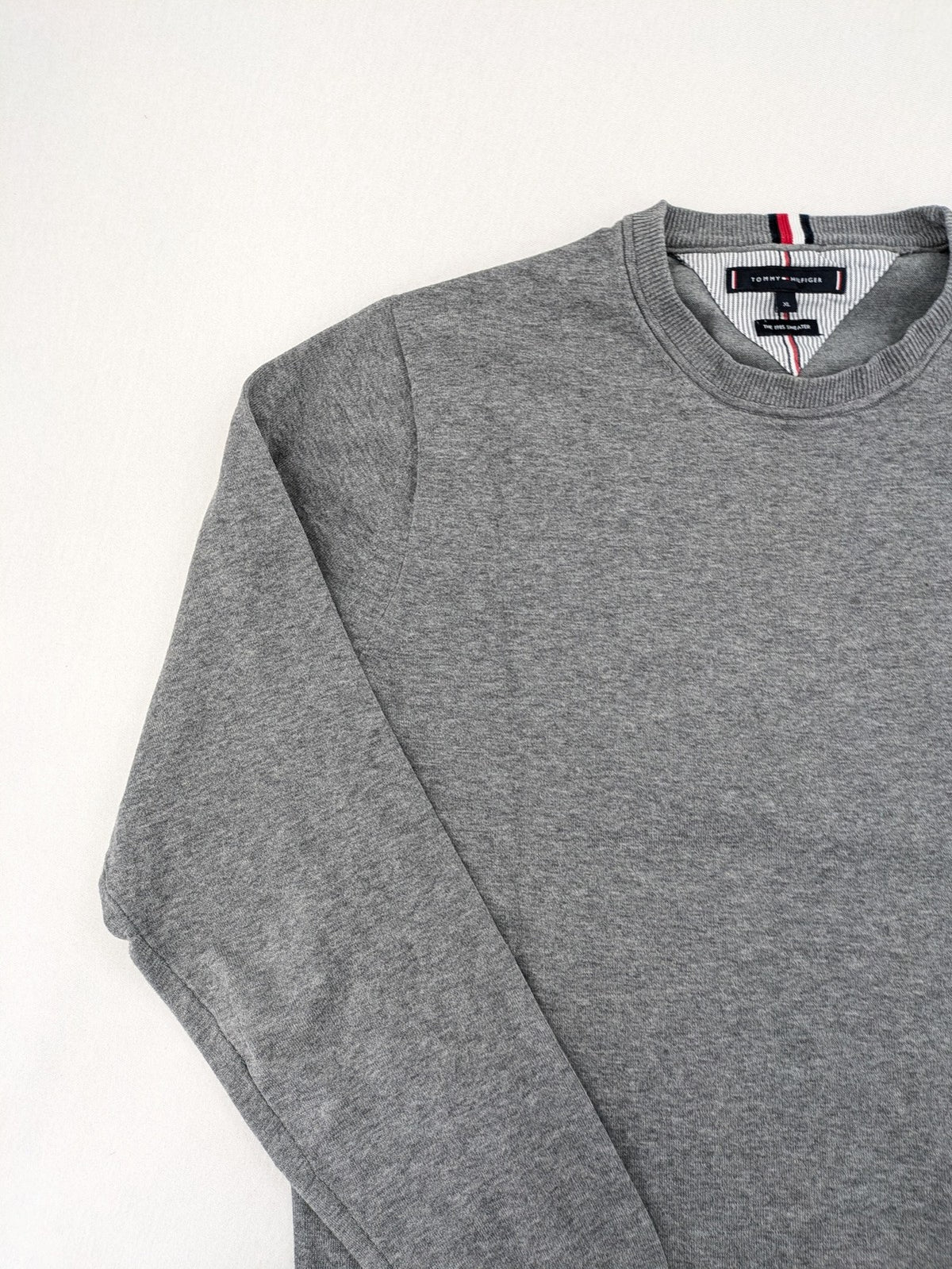 Tommy Hilfiger grey turtle neck jumper with embroidered flag logo, soft cotton blend.