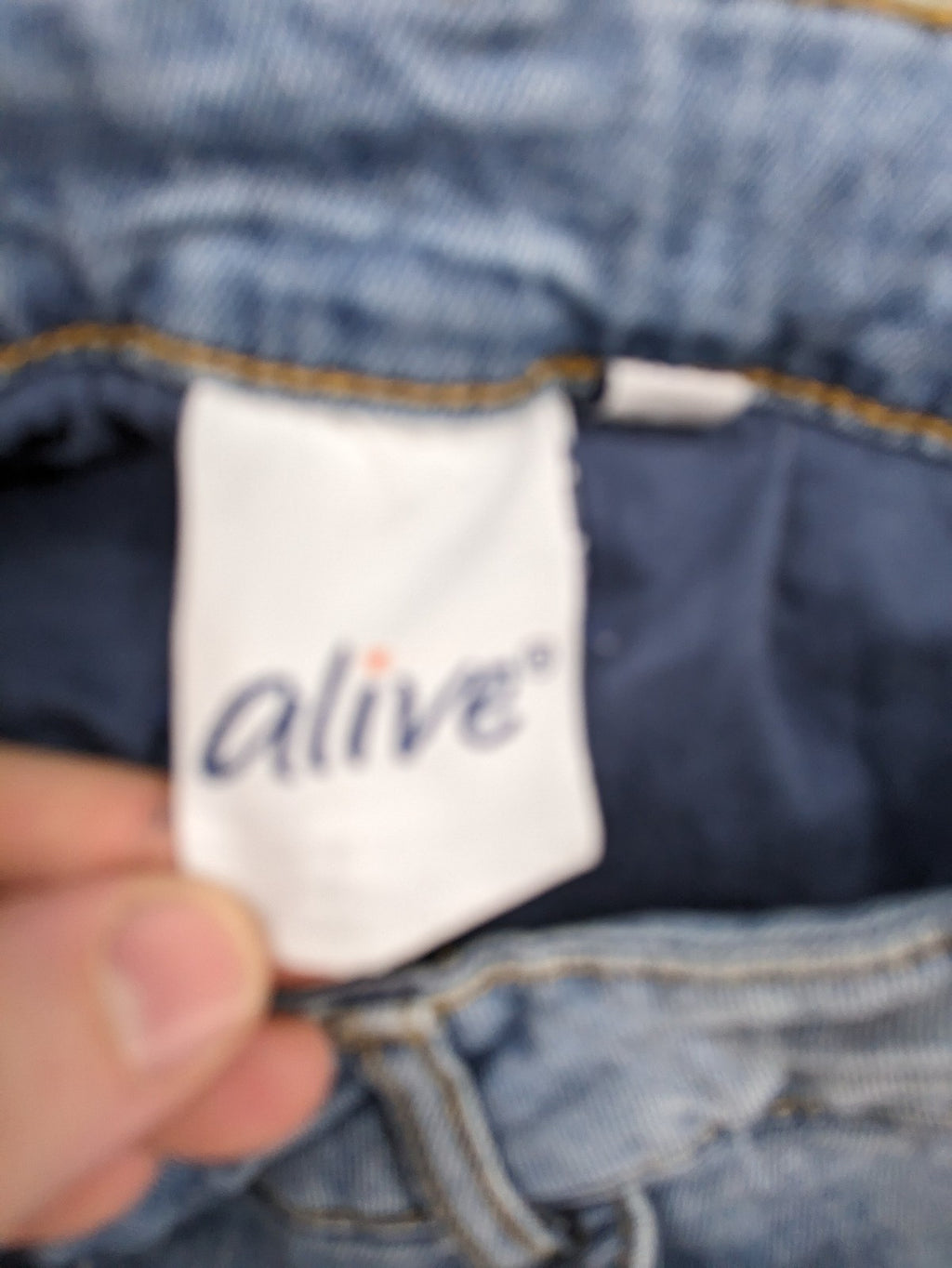 Alive blue straight jeans with classic cut, durable cotton-elastane blend, and button closure.