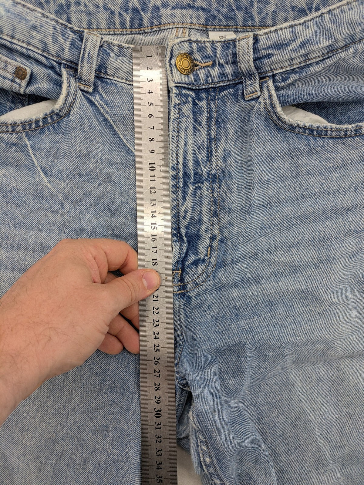 H&M blue wide leg jeans with distressed details and high waist, 100% cotton.