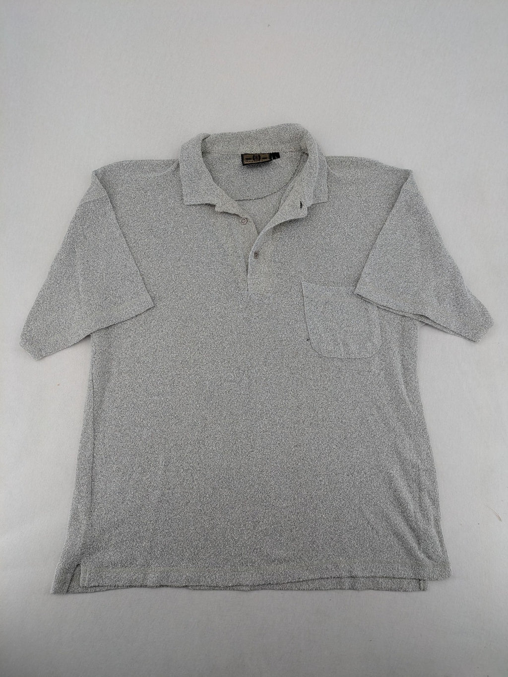 Headlands grey short sleeve polo shirt textured terry fabric with chest pocket.