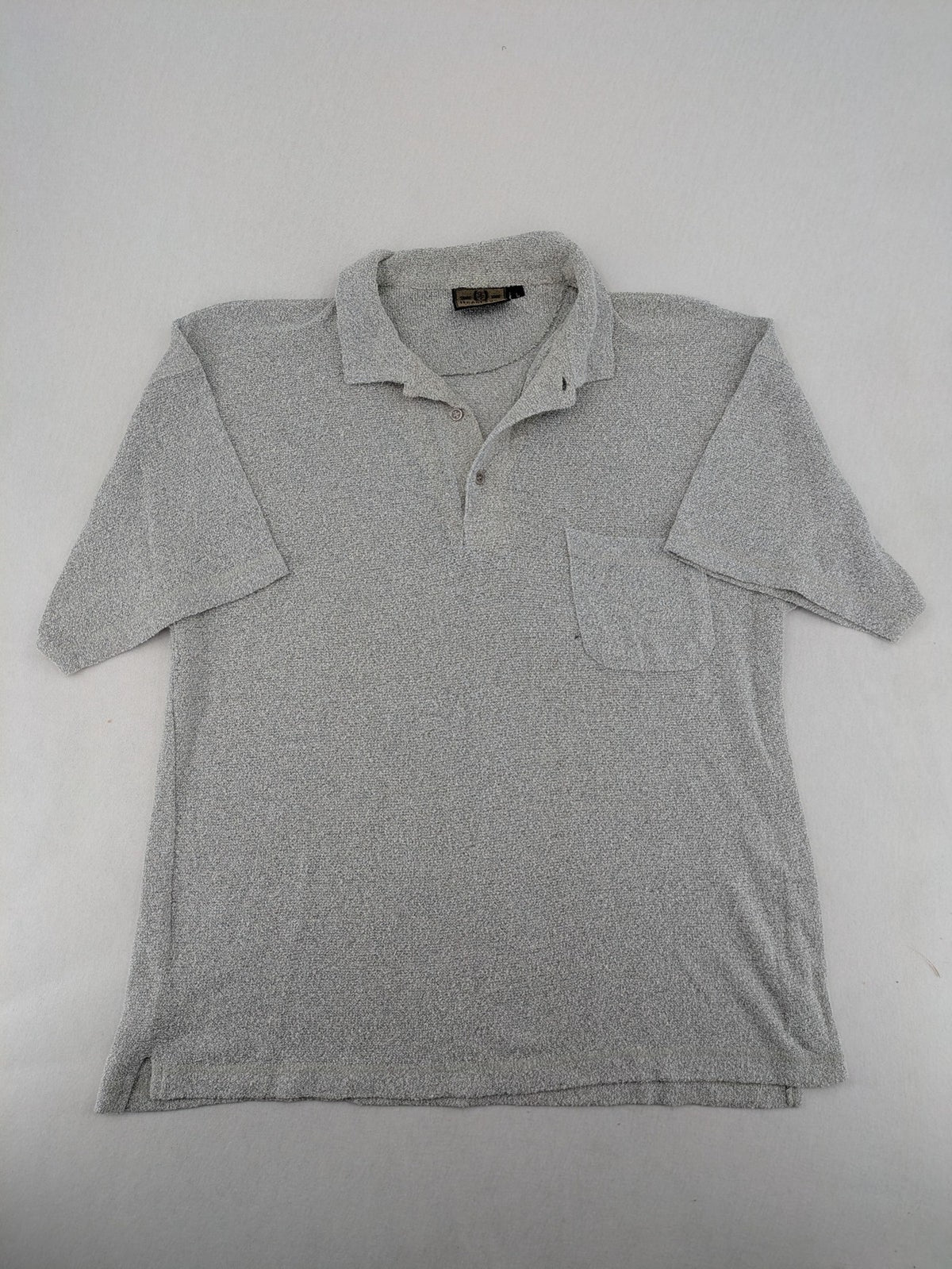 Headlands grey short sleeve polo shirt textured terry fabric with chest pocket.