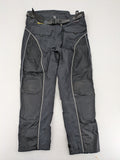 Polo black chaps with grey and white accents, featuring protective knee pads and adjustable belt.