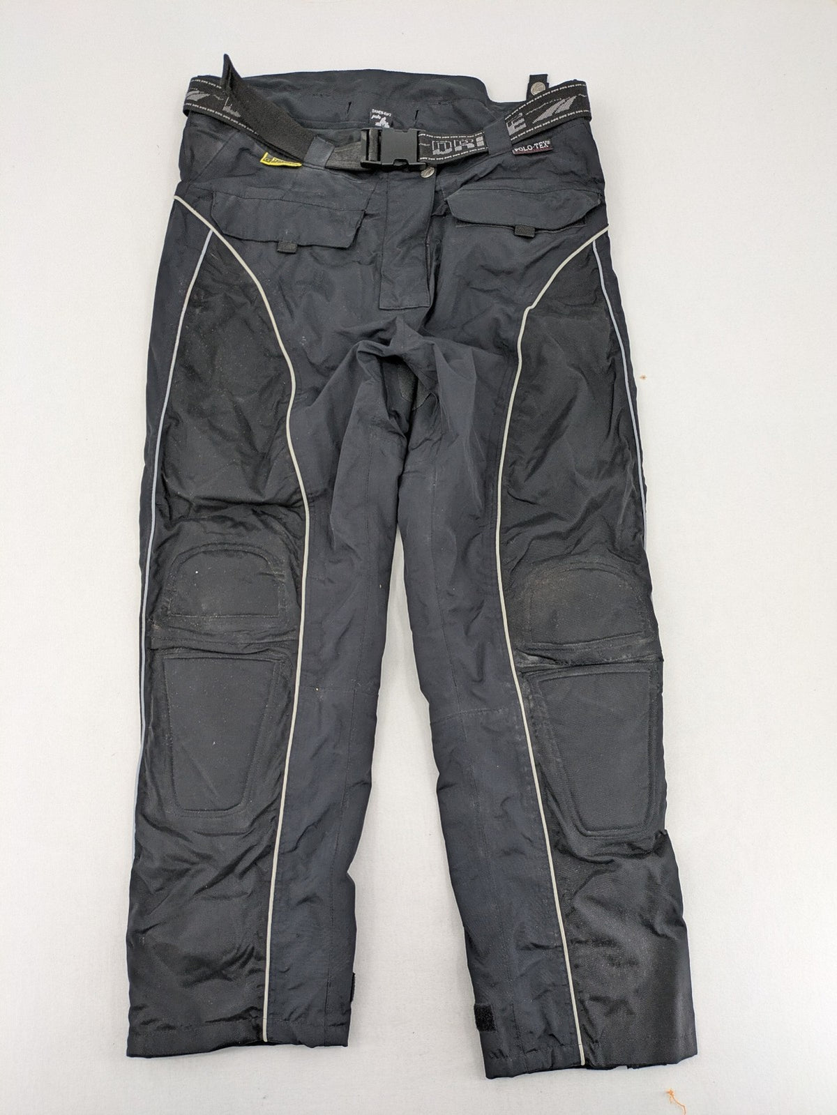 Polo black chaps with grey and white accents, featuring protective knee pads and adjustable belt.