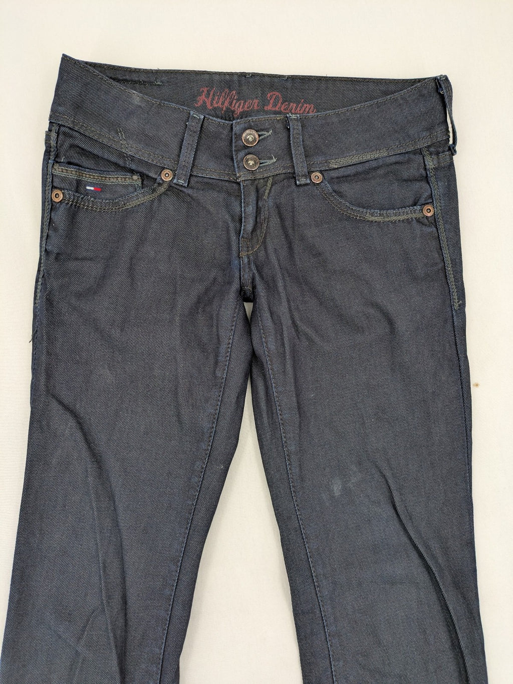 Hilfiger Denim blue straight jeans with double button closure and logo detail.