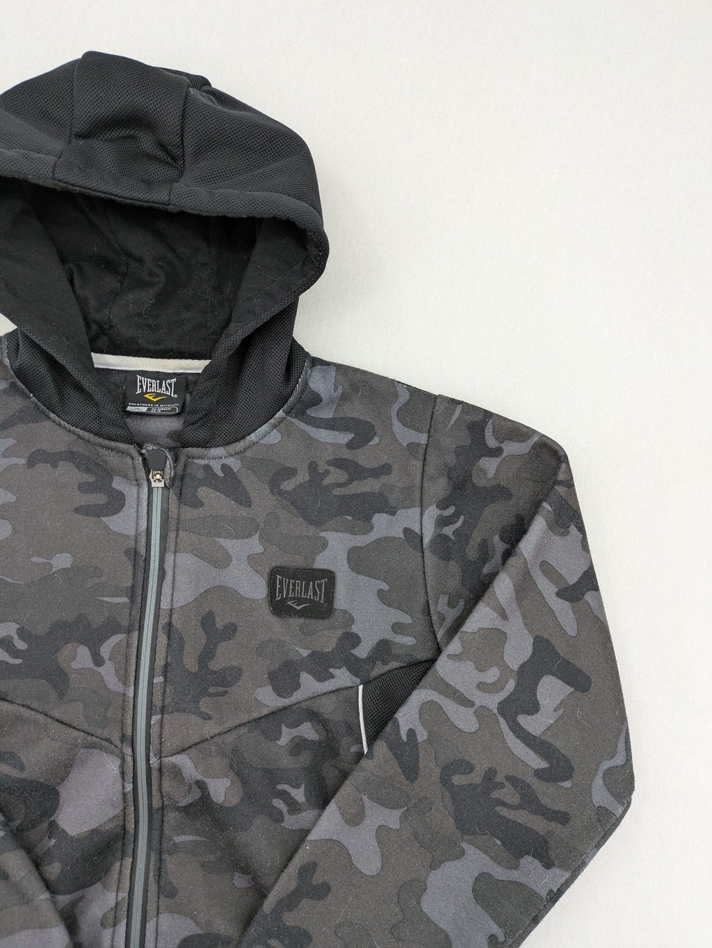 Everlast black grey camouflage jacket with full zip and attached hood.