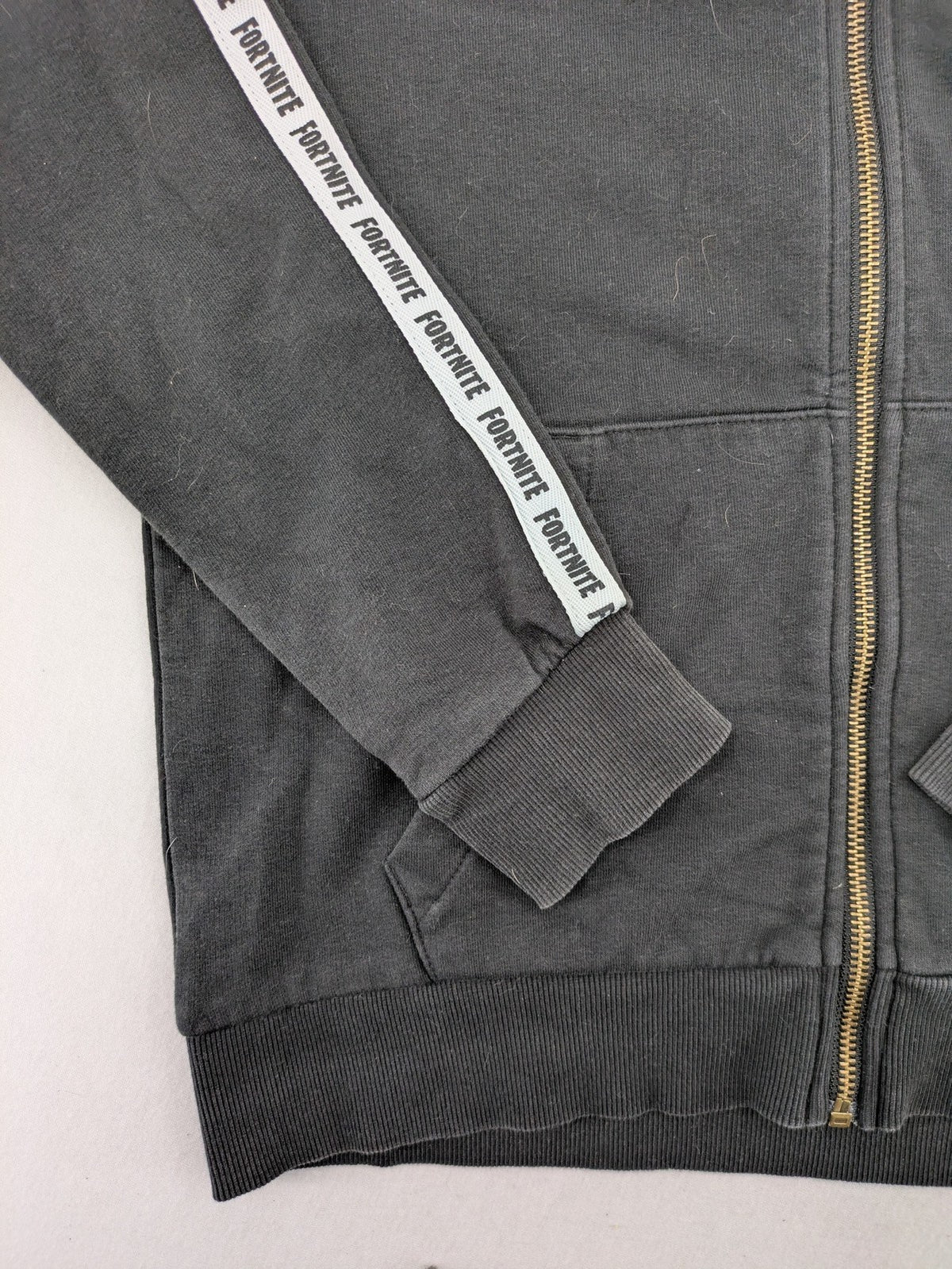 Fortnite black zip-through hoodie with logo on sleeves and Black Knight patch on chest.