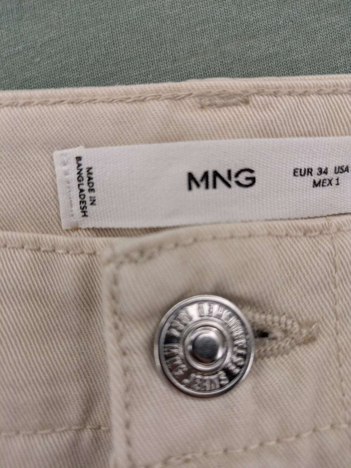 MNG beige cargo pants with straight leg, button closure, and patch pockets.