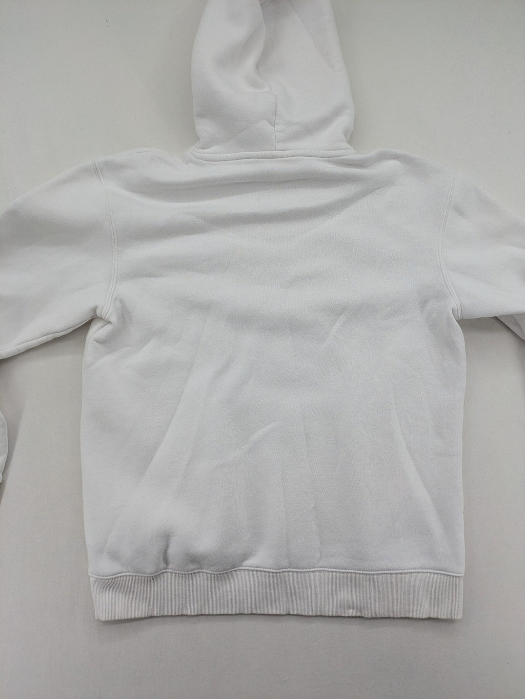 New York white hoodie with raised blue and red "GIANTS" logo and adjustable hood.