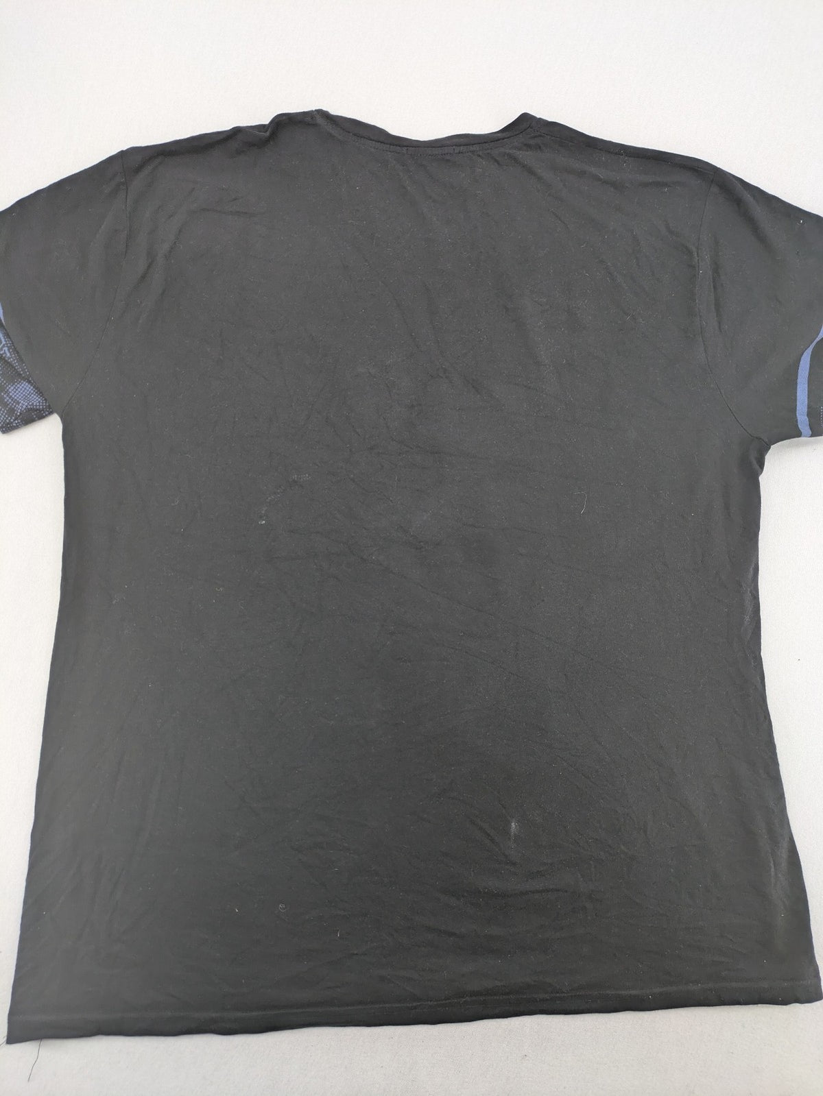 Pedro multi graphic t-shirt size 5XL with embroidered design and contrasting sleeve patterns.