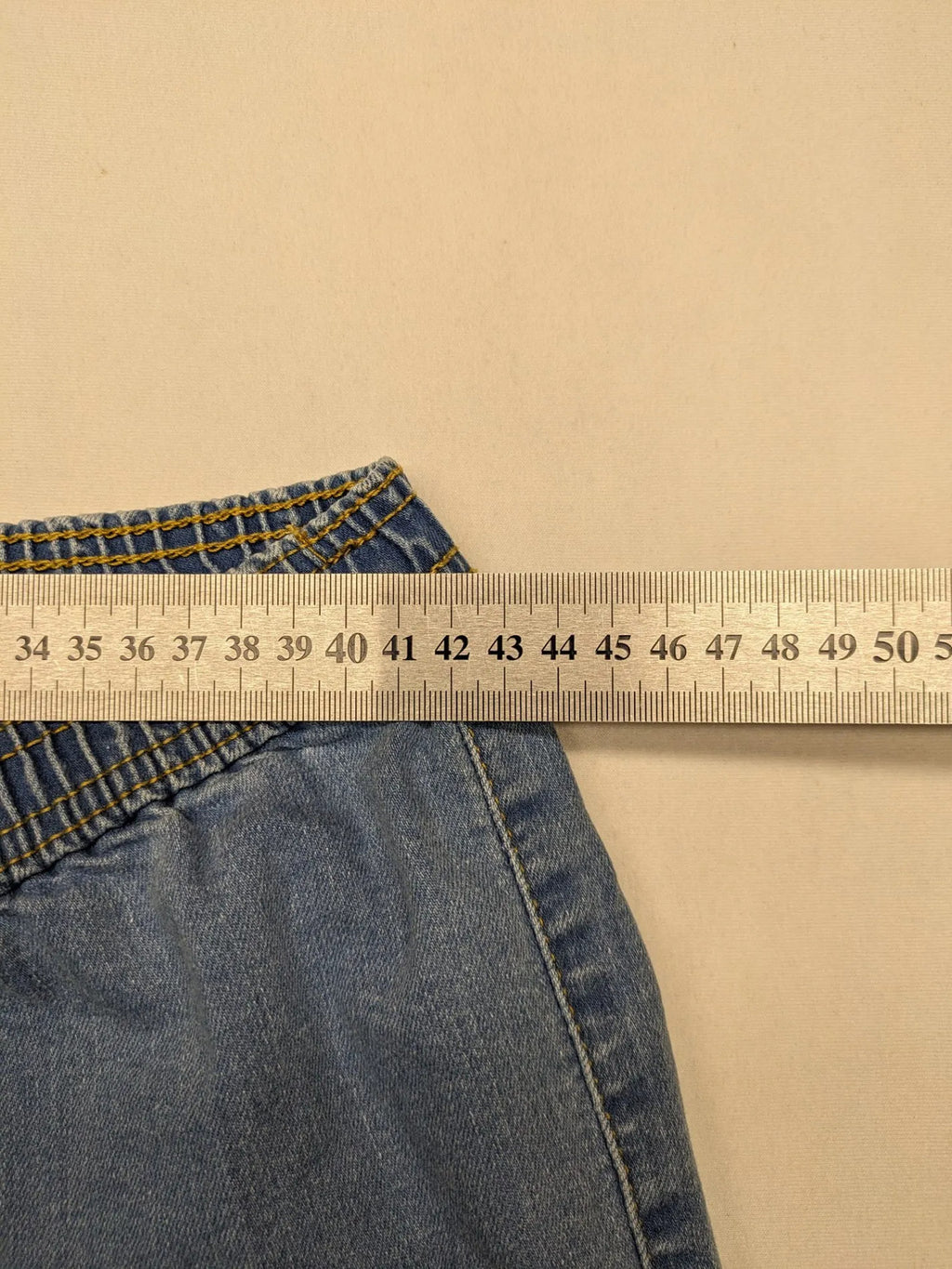 AproductZ blue straight jeans with elastic waistband and comfortable stretch fabric.