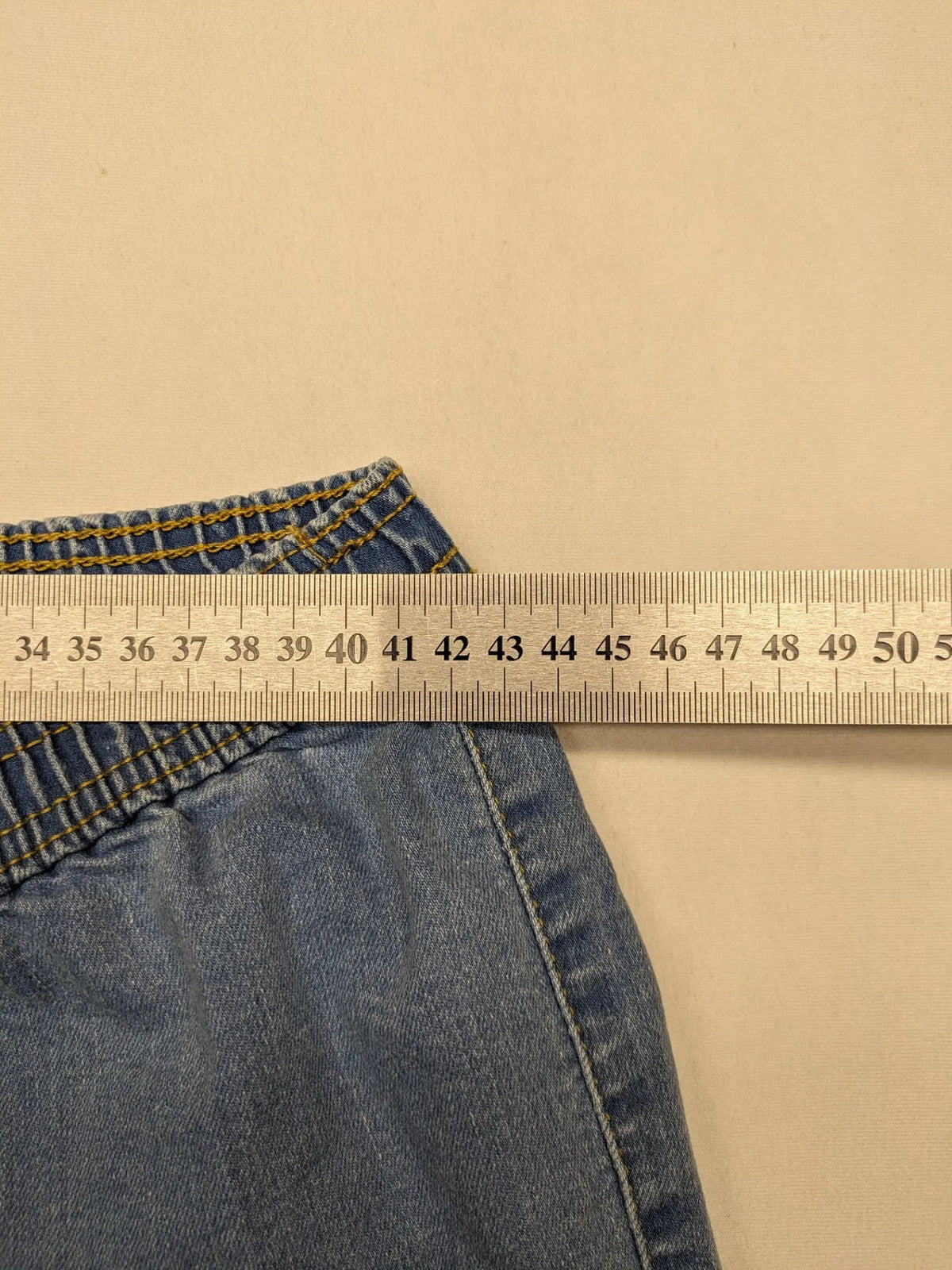 AproductZ blue straight jeans with elastic waistband and comfortable stretch fabric.