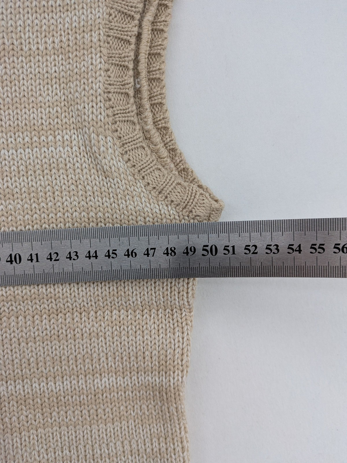 Pencini beige turtle neck jumper, sleeveless design, soft merino wool blend.