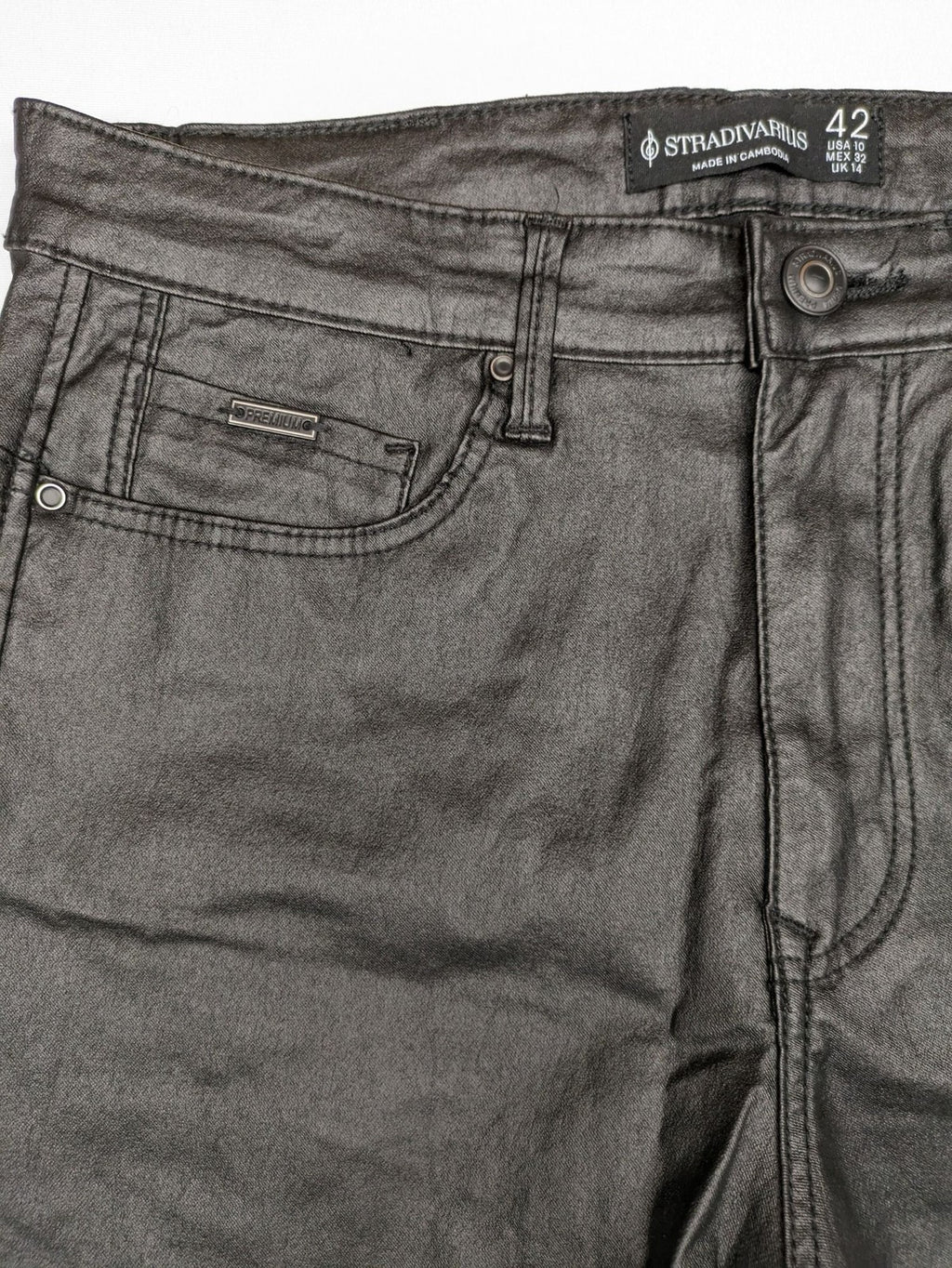 Stradivarius black coated straight jeans with leather-like finish and stretchy material.